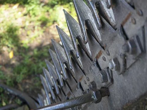 Close-up of teeth on a tractor plow. Selective focus Stock Photos