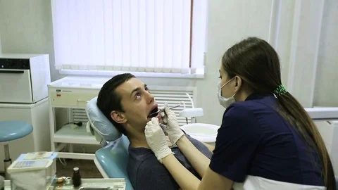 Close-up of a teeth treatment at the dentistry Video stock 70287354