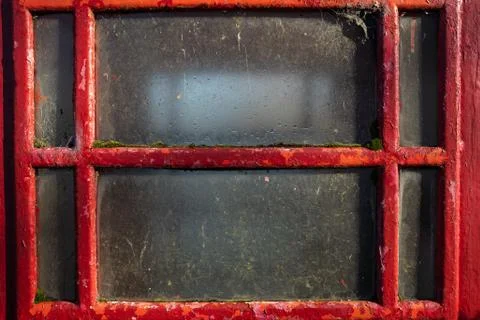 Close up of a telephone box window Stock Photos