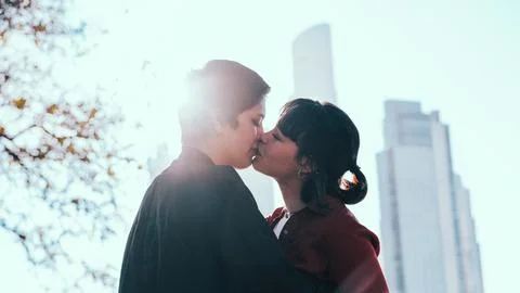 Close-up of the tender kiss shared between two young women Stock Photos