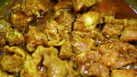 Close-up of tender meat curry in rich spiced gravy, Close-up view of tender.. Stock Footage 346465466