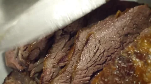 Close-up of Tender, Slow-Cooked Beef Brisket Slices. Stock Footage 332813299