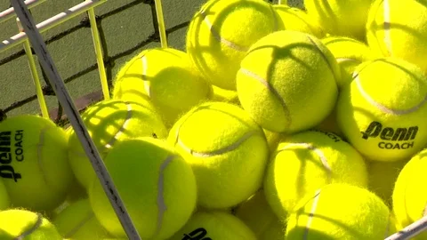 Close up of tennis balls in basket Stock Footage 125277853