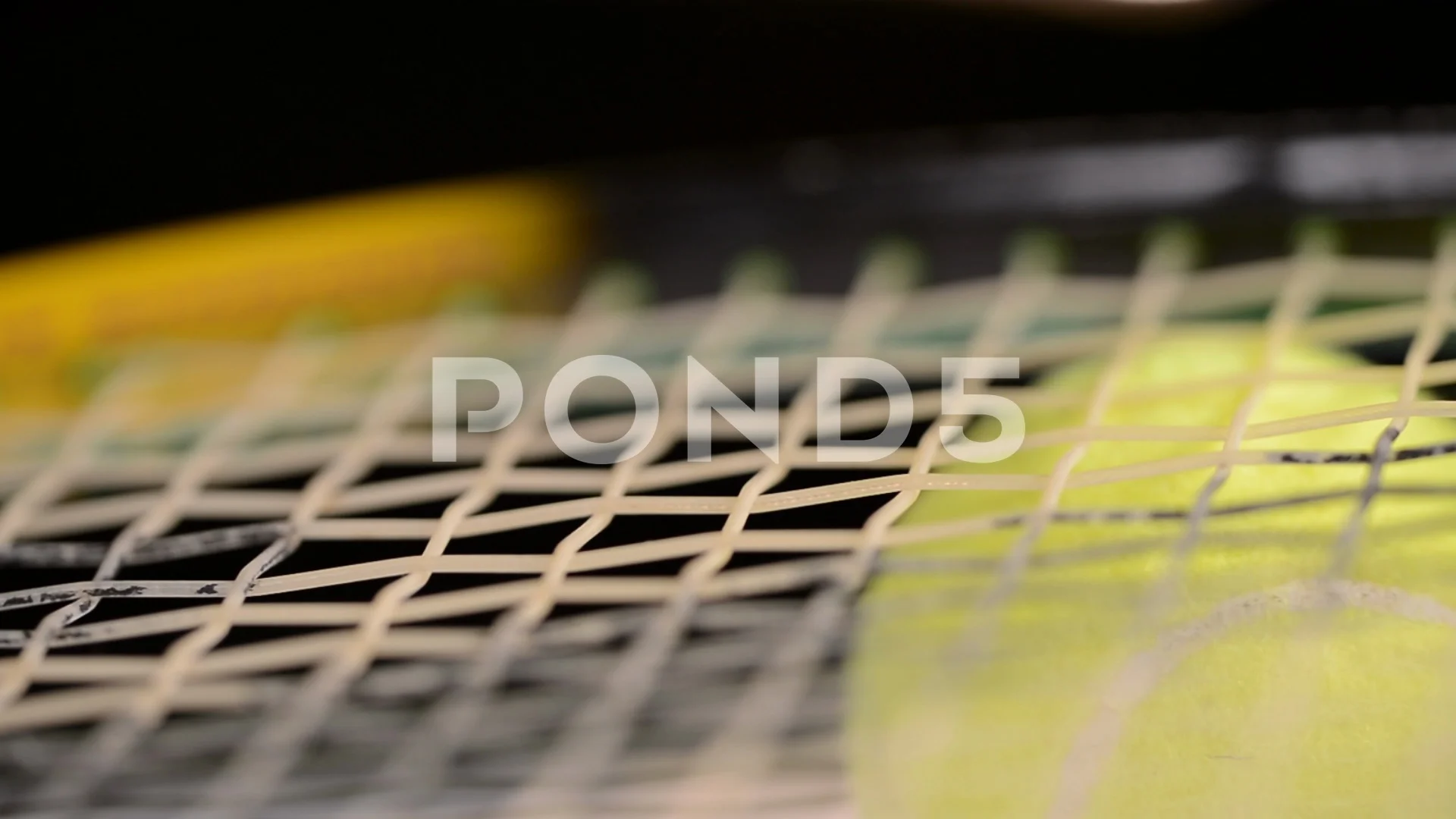 Close Up of Tennis Ball on String or Net of Tennis Racquet, Racket