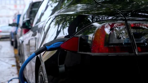 Close-up of Tesla Electric Car Charging Port Stock Footage 338372707