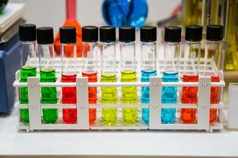 Close up of test tubes with multicolored solution	 Stock Photos
