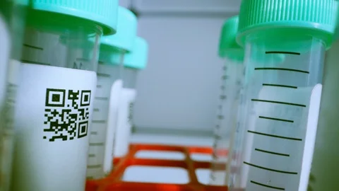 Close up test tubes with QR code. Design of the label is specially created fo Stock Footage 98618739