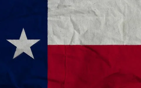 Close-Up Of TEXAS Flag With Blue Square, White Star, And Red Stripes Twisting Dr Stock Photos