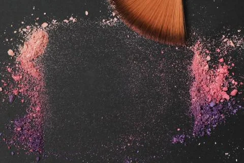 Close up. text frame with makeup brushes on black background Stock Photos