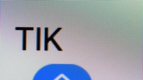 Close-up of text 'TIKTOK' in a search box Video stock 336185125