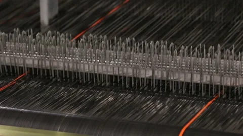 Close up of textile machine. Fibre thread lines on the weaving loom machine Video stock 126747668