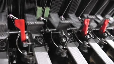Close up of textile machine in slow motion. Fibre thread lines on the weaving Stock Footage 220928101