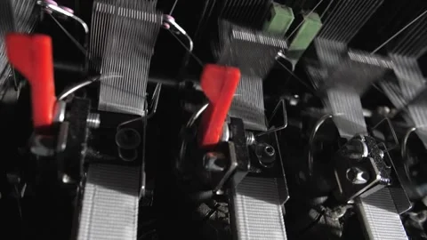 Close up of textile machine in slow motion. Fibre thread lines on the weaving Stock Footage 220928184