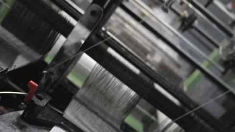 Close up of textile machine in slow motion. Fibre thread lines on the weaving Stock Footage 220928337