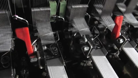 Close up of textile machine in slow motion. Fibre thread lines on the weaving Stock Footage 220928983