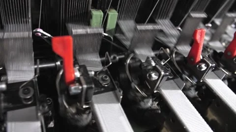Close up of textile machine in slow motion. Fibre thread lines on the weaving Stock Footage 221179302