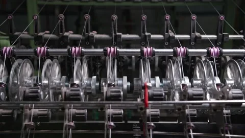 Close up of textile machine in slow motion. Fibre thread lines on the weaving Stock Footage 221179352