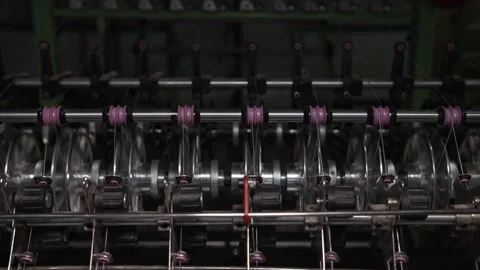 Close up of textile machine in slow motion. Fibre thread lines on the weaving Video stock 221179497