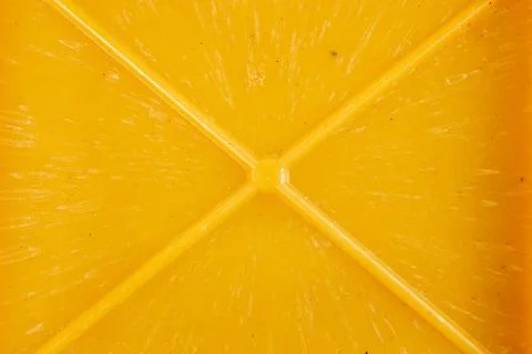 Close-up texture and background of yellow bakelite or carbolite plastic material Stock Photos