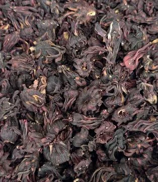 Close-up texture background of dried red roselle flowers Stock Photos
