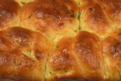 Close-up texture of baked bread rolls with chives Stock Photos