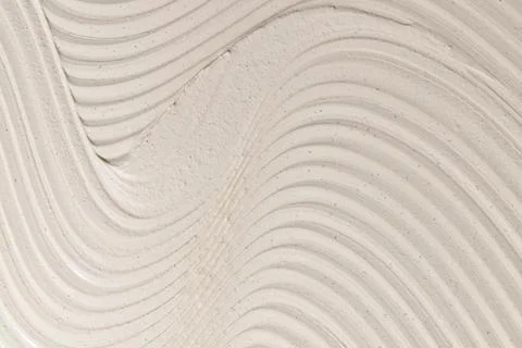 Close-up texture of beige moisturizing cream. Skin care product background. Stock Photos