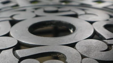 Close-up texture of black iron table as background Stock Photos