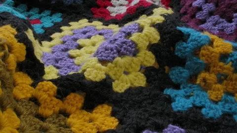 Close-up of the texture of the blanket embroidered with colored threads Stock Footage 166903212