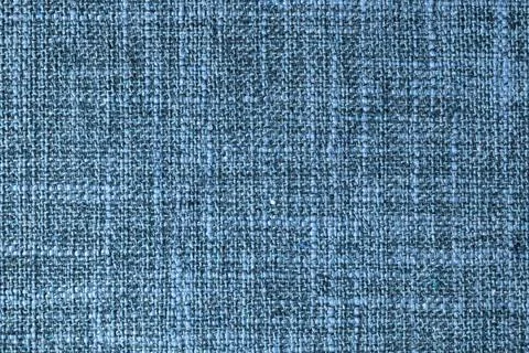 Close up texture of blue coarse weave upholstery fabric. Decorative textile.. Stock Photos