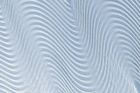 Close-up texture of blue moisturizing cream. Skin care product background. Stock Photos