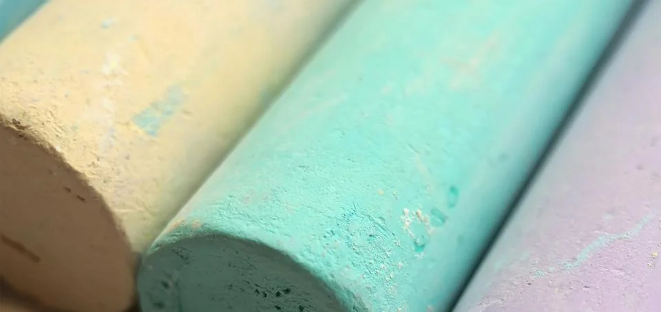 Close-up texture of chalk for drawing multicolored green, blue, yellow Stock Photos