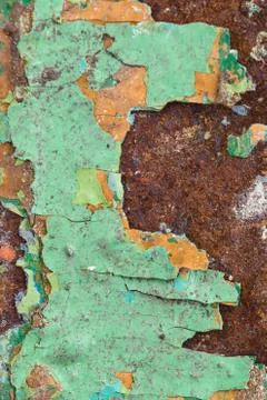 Close Up texture of Chipped peeling green paint over rust, cover Stock Photos