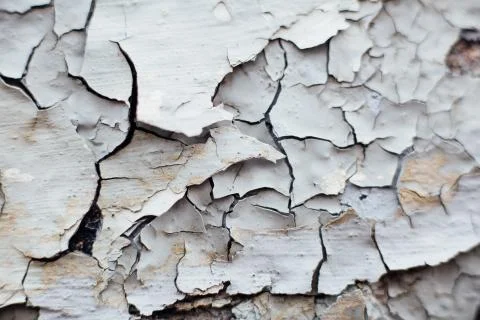 Close Up texture of Chipped White peeling paint, covered with cr Stock Photos