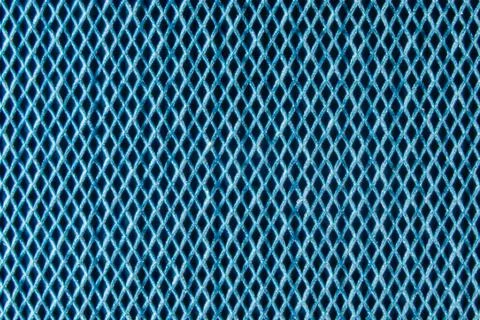 Close-up texture of colored synthetic polyester fabric. Stock Photos