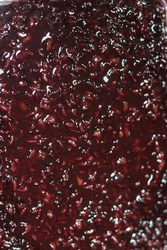 Close-up texture of cooked black glutinous rice porridge (Bubur Ketan Hitam) Stock Photos