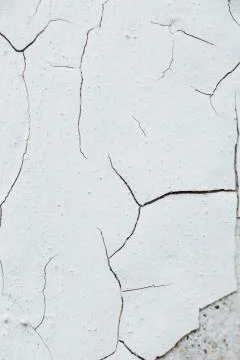 Close Up texture crack of Chipped White peeling paint, covered w Stock Photos
