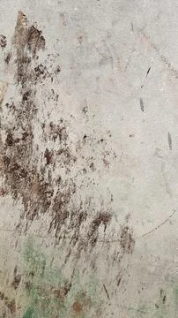 Close-up texture of cracked white plaster with brown water stains . 스톡 사진