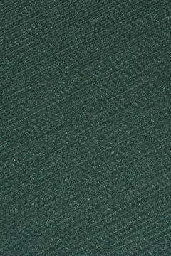 Close up texture of dark green hook and loop fabric surface Фото