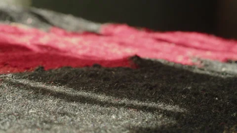 Close-up texture of decorative woolen bed cover 4K video Stock Footage 221955054