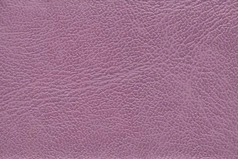 Close-up texture of dusty mauve pebbled leather grain Stock Photos