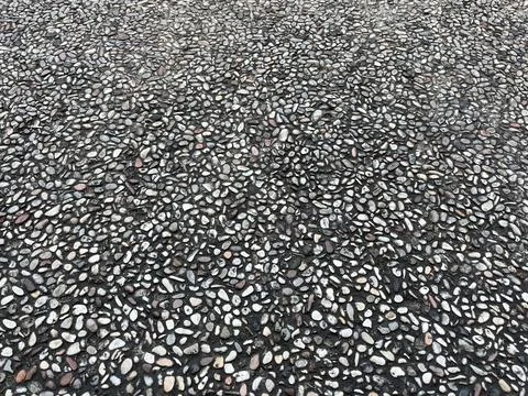 Close-up texture of exposed aggregate concrete surface Stock Photos