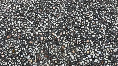 Close-up texture of exposed aggregate concrete surface Stock Photos