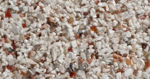 Close-up texture of fine marble chips. Vidéo 166886656