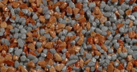 Close-up texture of fine marble chips. Amber and blue color. Stockbeeldmateriaal 168281319