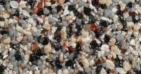 Close-up texture of fine marble chips. Grey and black and beige color. 스톡 동영상 168281409