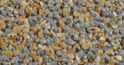 Close-up texture of fine marble chips. Grey and sand color. Vidéo 168281465