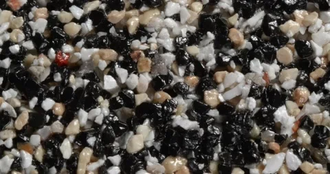 Close-up texture of fine marble chips. Multi color. Vidéo 169493391