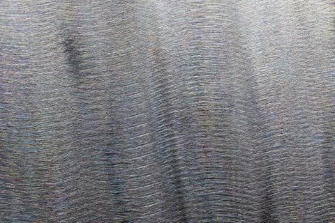 Close-up texture of flat steel surface manually cleaned with a flap wheel angle Stock Photos
