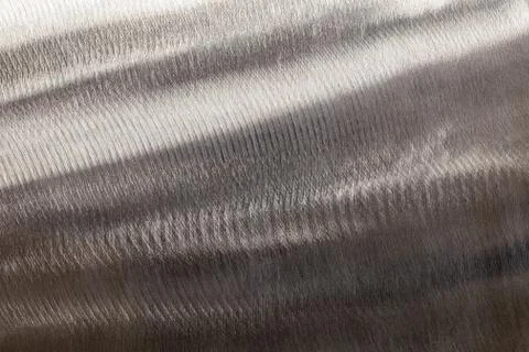 Close-up texture of flat steel surface manually cleaned with a flap wheel angle Stock Photos