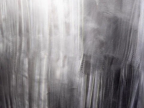 Close-up texture of flat steel surface manually cleaned with a flap wheel angle Stock Photos